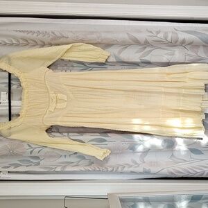 Yellow dress with pearl details marked as large fits like S/M